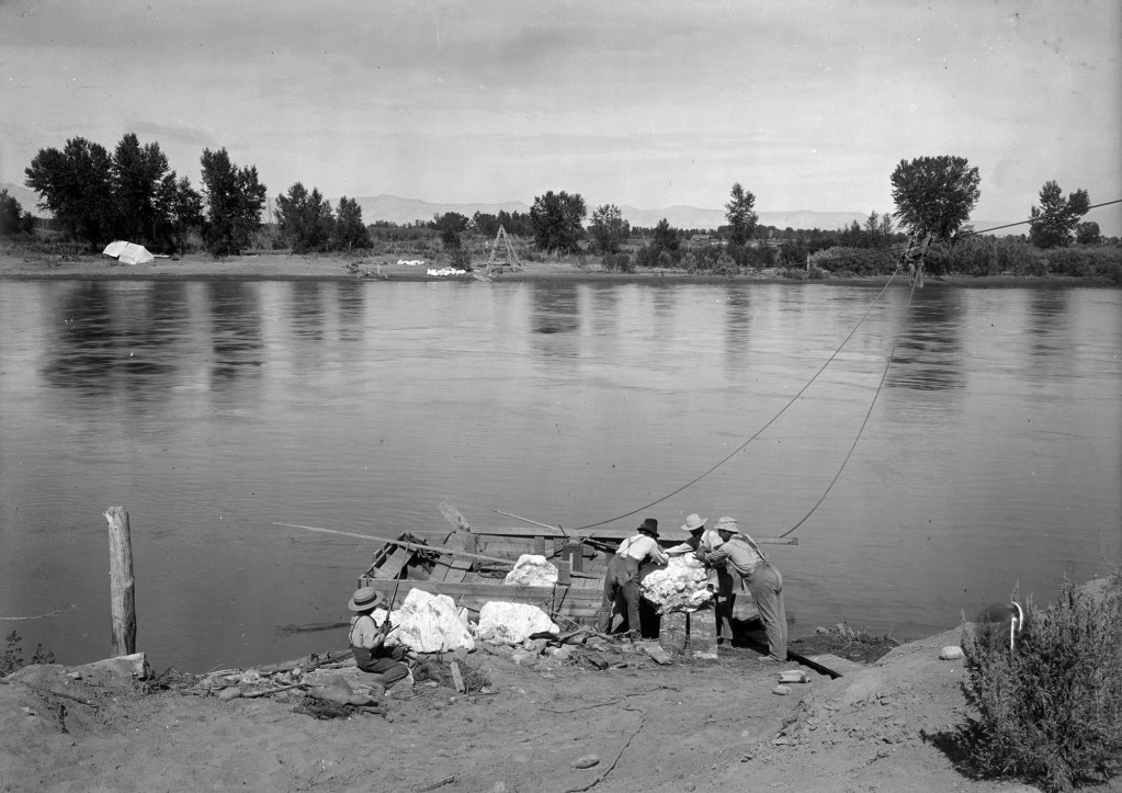 Men loading a ferry boat at Colorado River, near Quarry 15.